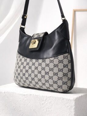 Authentic Gucci Canvas/Leather Shoulder Bag.